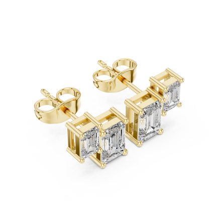 1.47ctw Asymmetric Emerald Cut Diamond Duo Stud Earrings in Yellow Gold