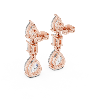 The Triple Tier Sparkle: Pear and Emerald Cut Statement Drop Earrings
